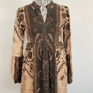 Rustic Juliet styled dress with cinched waste and sleeves